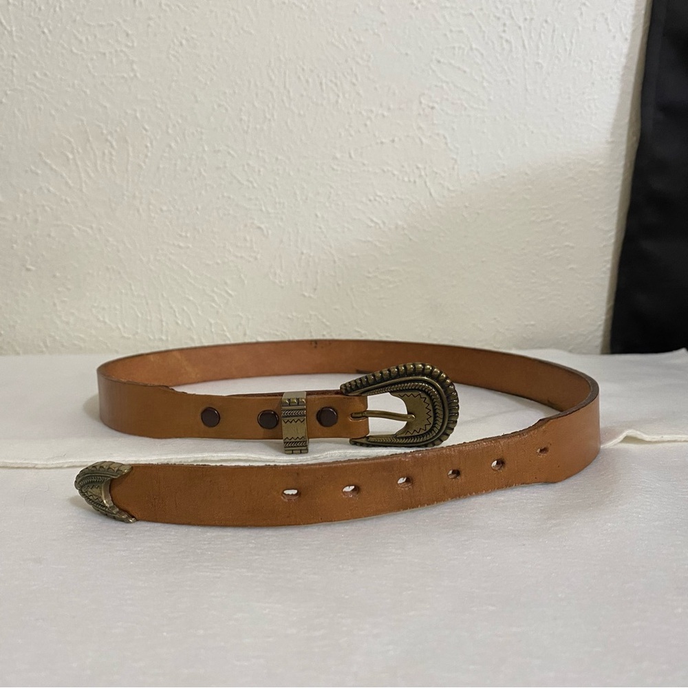 Size 30 brown with western style buckle